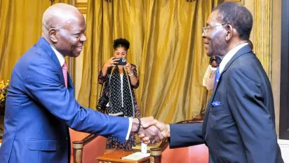 ILO Director-General Gilbert F. Houngbo shakes hands with the President of the Republic of Equatorial Guinea, Mr. Obiang Nguema