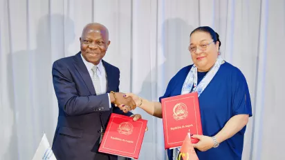 Minister of Public Administration, Labour and Social Security of Angola, Teresa Dias Rodrigues, with ILO Director-General Gilbert F. Houngbo, shake hands after signing of country office agreement in Luanda